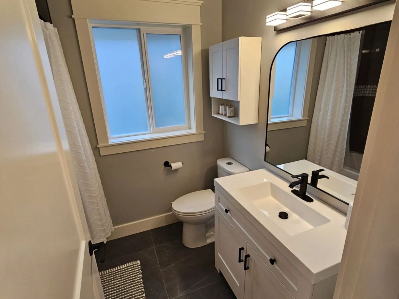 Completed bathroom renovation by Rise Renovations & Decks