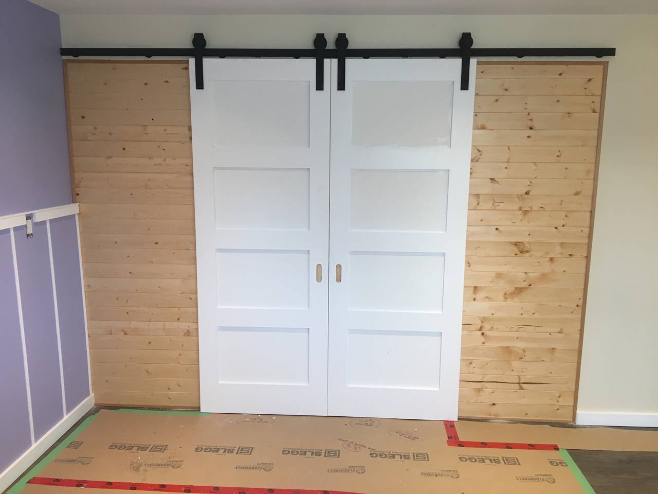 Barn doors and built-ins - in progress - barn door installation