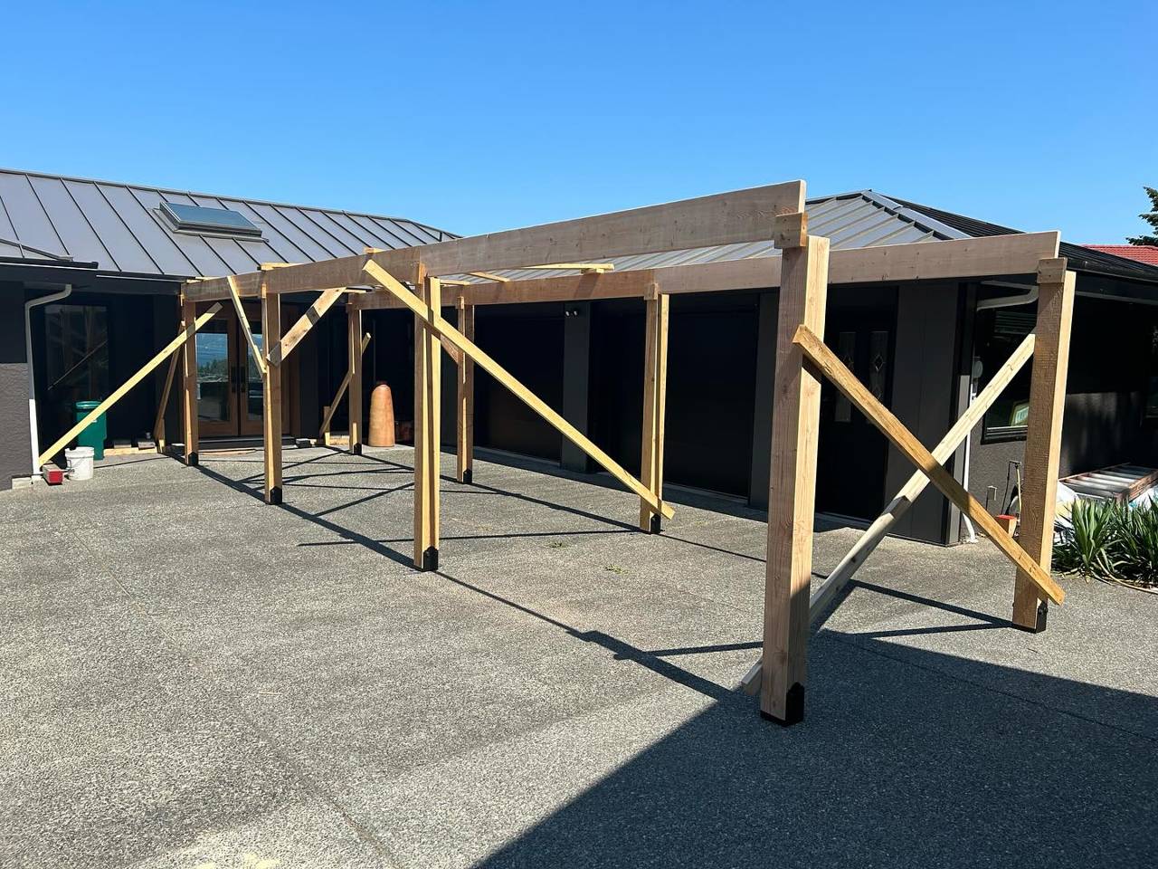 Custom outdoor living space - in progress - framing